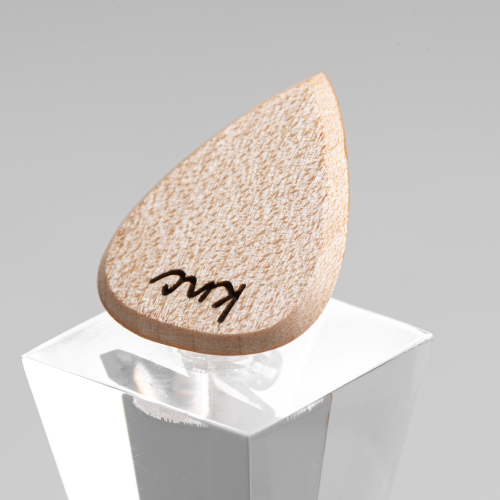 A personalized Maple wood pick with a custom name laser-engraved below the Knc logo.