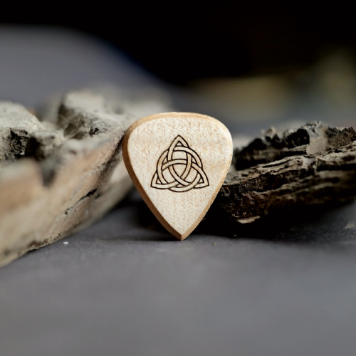 The back of a Purpleheart pick showing an example of custom laser-engraved text for personalization.