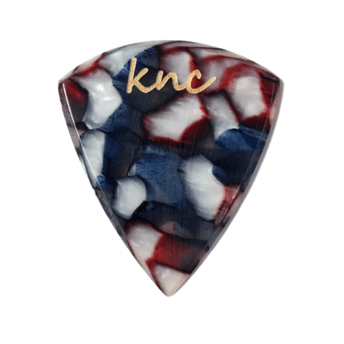 A Knc Picks handmade guitar pick made from Rainbow Galalith (Casein), showing the vibrant, pearlescent multi-color patterns.