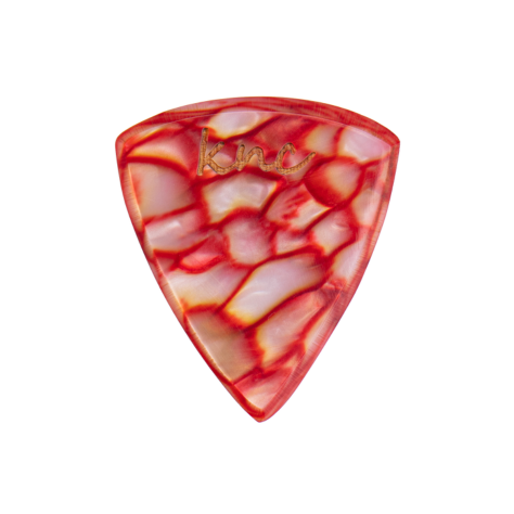 A Knc Picks handmade guitar pick made from Red Galalith (Casein), showing the vibrant, pearlescent red swirl patterns.