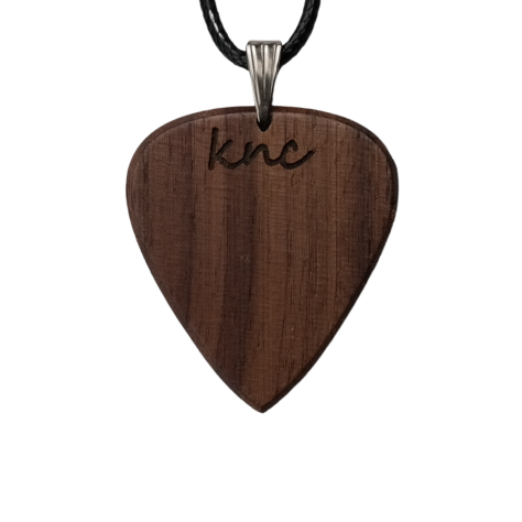 A handmade Knc Picks Walnut wood guitar pick, showing its dark grain, attached to a stylish necklace chain.(product can lok slihgtly different from picture since its made of natural materials.)