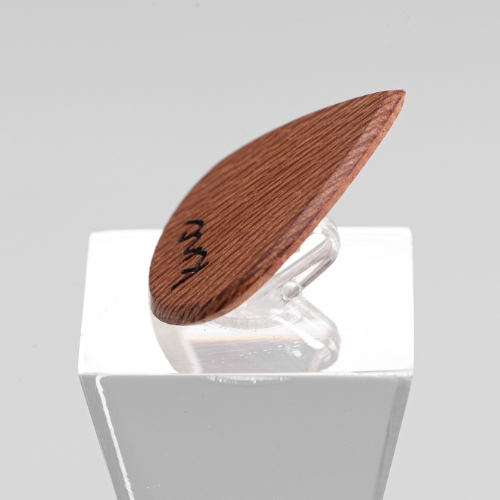 The complete custom 'Lil One' Lacewood pick set, including the necklace and wooden gift box.