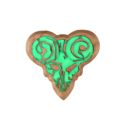 Close-up detail of the 'Pick of Destiny' pick, showing the unique texture of the Luminous Galalith material.