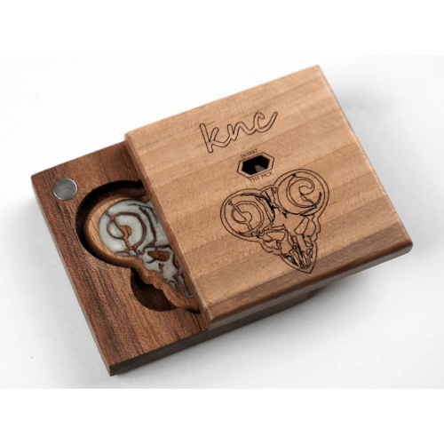 The 'Pick of Destiny' pick presented in an optional Knc Picks premium wooden gift box.