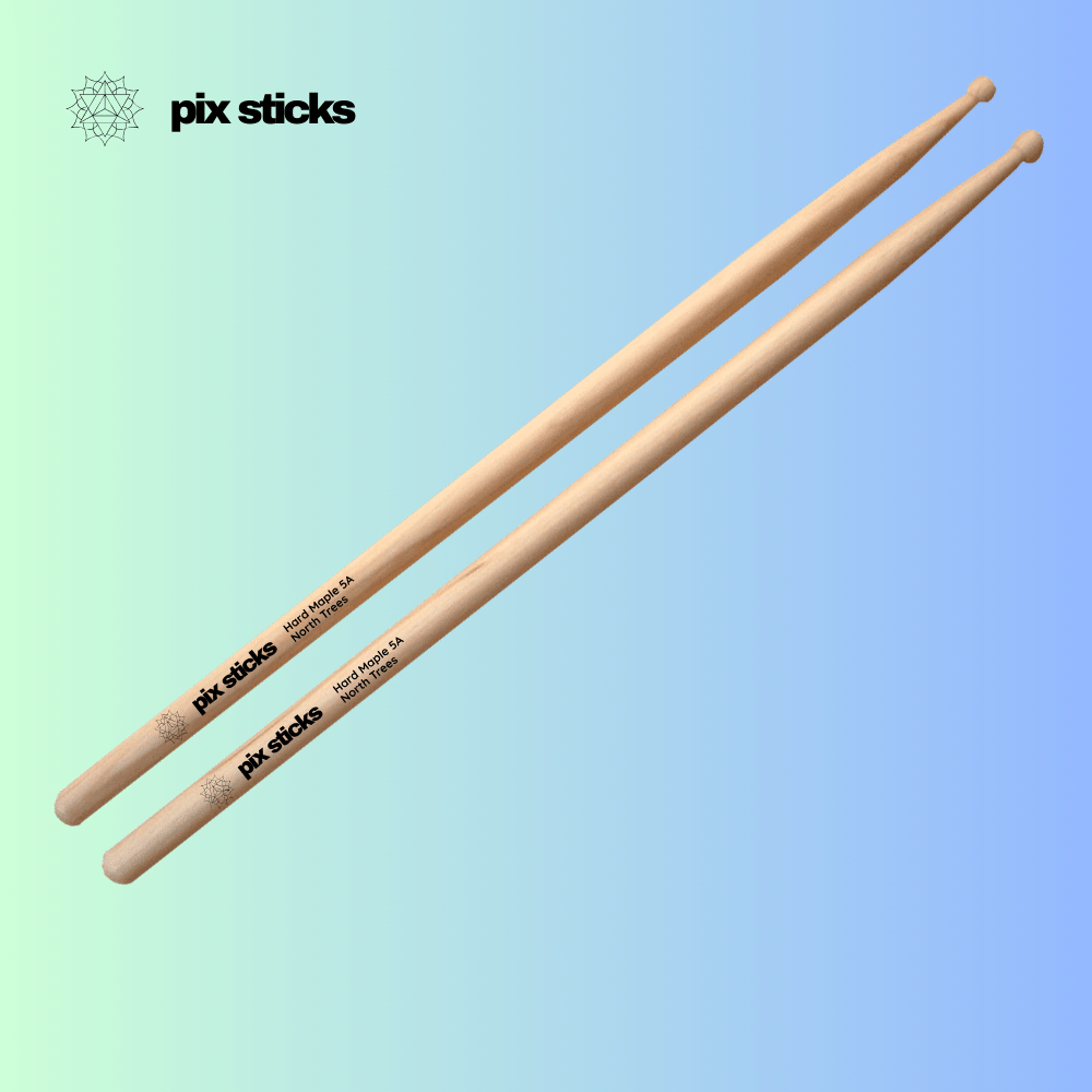 A pair of Pix Sticks custom drumsticks, made from eco-friendly bio-plastic and featuring a personalized laser-engraved name.