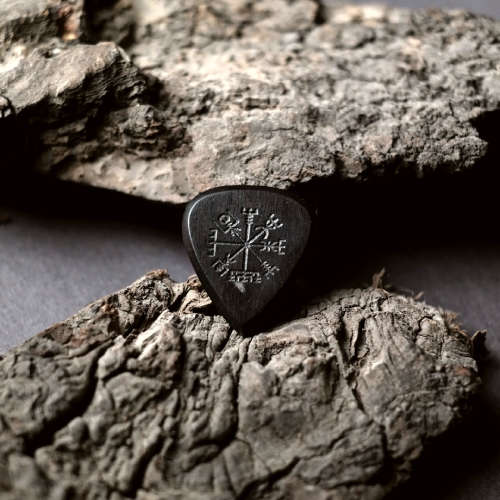 The Knc Picks Vegvisir engraved guitar pick, made from premium dark Ebony wood.