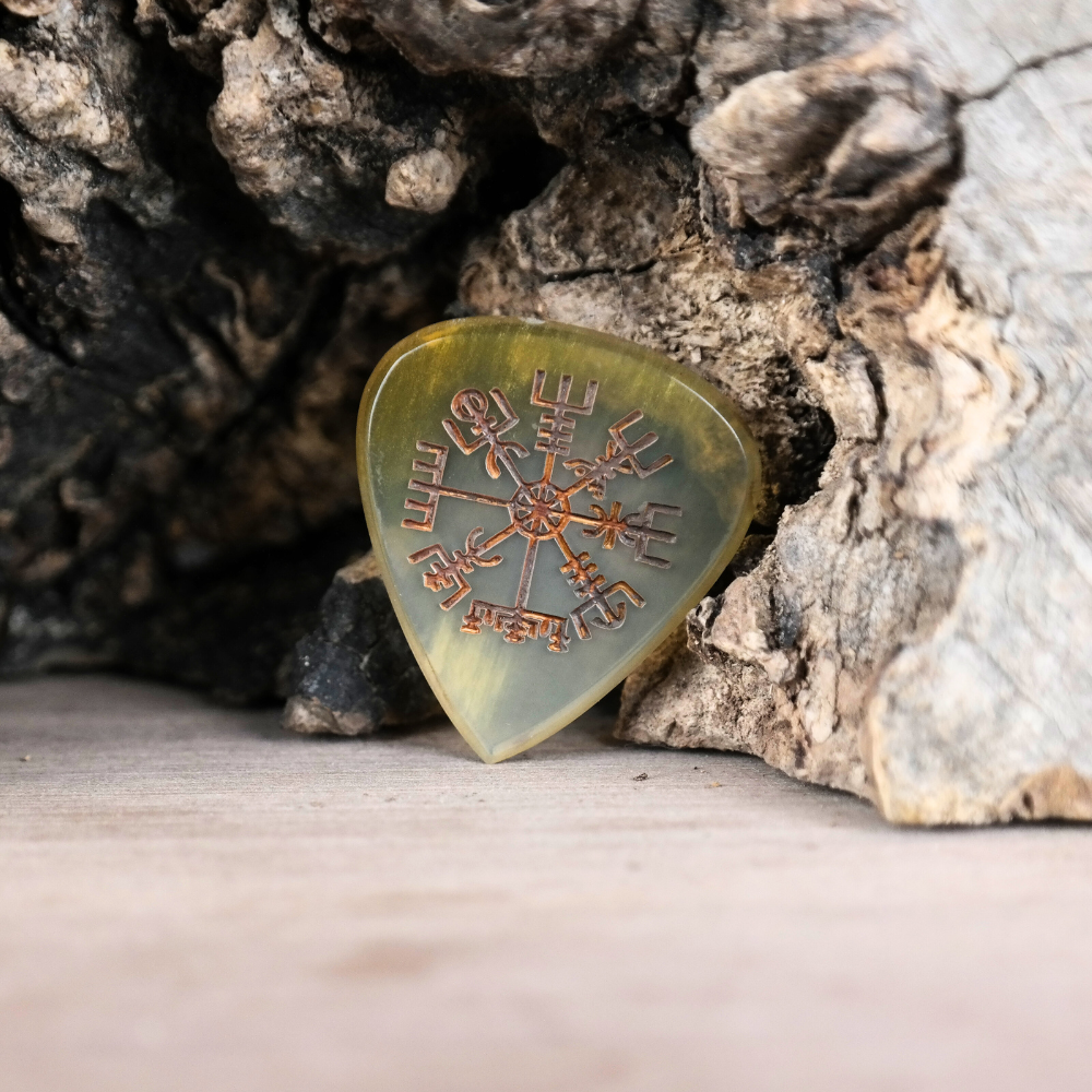 The back of the horn pick showing a custom name engraving for personalization.