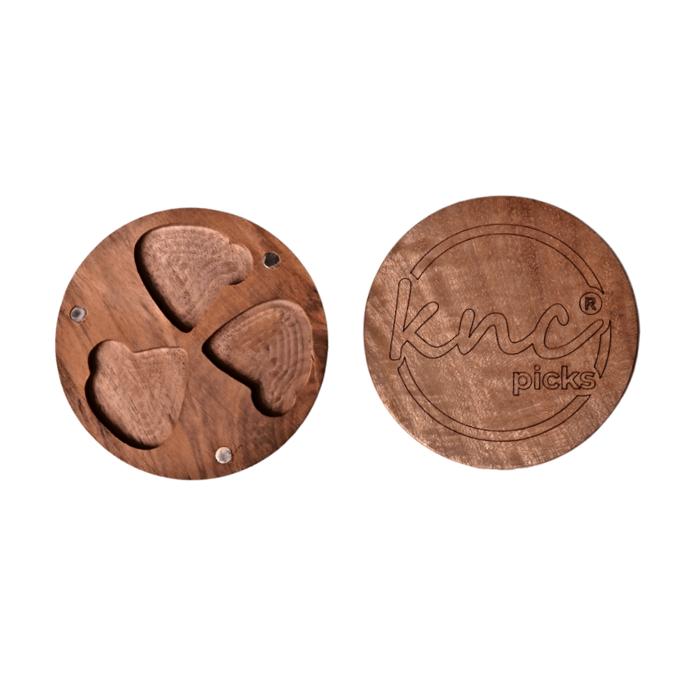 The 3-Piece Wooden Pick Box shown open, highlighting the soft interior lining (or 3 slots) designed to protect guitar picks.